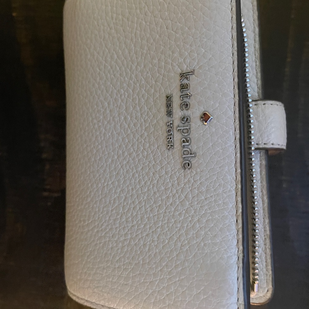 Beautiful baby blue Kate Spade wallet.  Barely used.